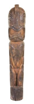 A Carved Wood Tiki