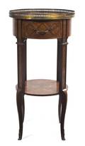 A Louis XVI Style Marquetry Parquetry and Gilt Metal Mounted Diminutive Commode
