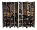A Chinese EightPanel Coromandel Lacquered Folding Screen