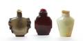 A Group of Three Hardstone Snuff Bottles