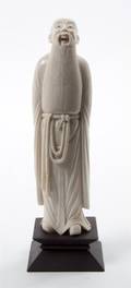 A Chinese Carved Ivory Figure of a Sage