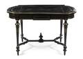 A Napoleon III Ebonized and Brass Inset Table a Milieu