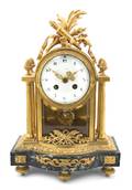 A French Gilt Bronze and Marble Mantel Clock retailed by JE Caldwell  Co