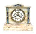 A French Onyx and Champleve Mounted Mantel Clock