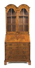 A Queen Anne Style Walnut Double Domed Secretary Bookcase