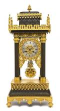 A Gothic Revival Gilt and Patinated Bronze Portico Clock