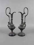 A Pair of Neoclassical Cast Metal Ewers