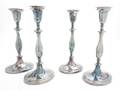 A Set of Four English Silverplate Candlesticks
