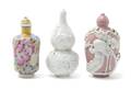 A Group of Two Molded Porcelain Snuff Bottles
