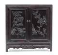 A Chinese Carved Hardwood Diminutive Cabinet