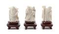 A Group of Three Carved Ivory Figures