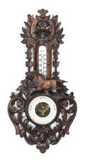 A Black Forest Style Carved Walnut Barometer Klickman