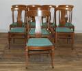 A Set of Eight Quarter Sawn Oak Dining Chairs