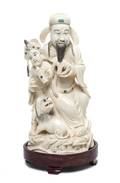 A Chinese Carved Ivory Figural Group