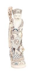 A Japanese Carved Ivory Okimono of an Immortal