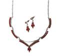 A Zuni Sterling Silver and Coral Necklace and Matching Earrings