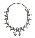 A Zuni Sterling Silver and Turquoise Squashblossom Necklace