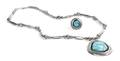 A Navajo Sterling Silver and Turquoise Pendant and Matching Ring Jimmy Herald