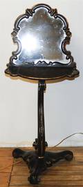 An Ebonized and Giltwood Shaving Stand