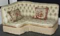 An Upholstered Corner Settee