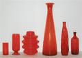 Six American Orange Glass Vases