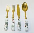 A Gilt Metal and Porcelain Mounted Partial Flatware Service