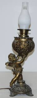 A Victorian Gilt Metal Figural Oil Lamp