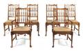 A Set of Six American Walnut Dining Chairs