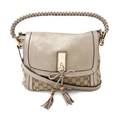 A Gucci Monogram Canvas and Metallic Leather Bag