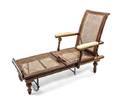 A Mahogany Suede and Caned Rolling Deck Chair