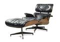 A Charles and Ray Eames Walnut 670 Lounge Chair and 671 Ottoman American 19071978 American 19121988