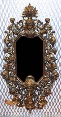 A Rococo Style Gilt Metal Mirror