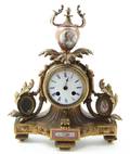 A Sevres Style Gilt Bronze and Painted Porcelain Mounted Mantel Clock
