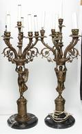 A Pair of Continental Figural SixLight Gilt Metal Candelabra
