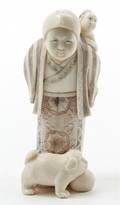 A Japanese Carved Ivory Okimono