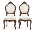 A Pair of Louis XV Style Walnut Side Chairs
