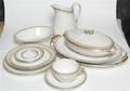 A Limoges Porcelain Partial Dinner Service