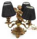 A Neoclassical Gilt Metal FourLight Candelabrum