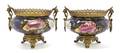 A Pair of Aesthetic Movement Gilt Metal Mounted Porcelain Urns