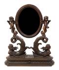 A Venetian Carved Walnut Dressing Mirror