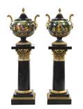 A Pair of Continental Polychrome Decorated Urns