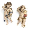 A Pair of Continental Painted and Parcel Giltwood Figures