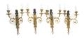 A Set of Four Neoclassical Patinated and Parcel Gilt Bronze TwoLight Figural Sconces