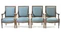 A Set of Four Louis XVI Style Giltwood Open Armchairs