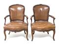 A Pair of Louis XV Style Walnut Fauteuils