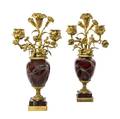 A Pair of French Gilt Bronze and Agate ThreeLight Candelabra