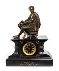 A French Gilt Bronze and Slate Figural Mantel Clock
