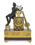 An Empire Parcel Gilt and Patinated Bronze Mantel Clock