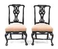 A Pair of Chippendale Style Ebonized and Parcel Gilt Side Chairs