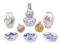 An Assembled Collection of Asian Porcelain and Terra Cotta Articles